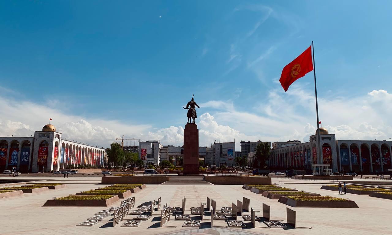 <h3>ALA-TOO SQUARE</h3>Ala-Too Square serves as the bustling heart of Bishkek, Kyrgyzstan's capital city. Dominated by the monumental Manas statue, the square is a central gathering place for locals and visitors alike. It hosts various events, protests, and celebrations, reflecting the city's cultural and political life. The grand State Historical Museum overlooks the square, offering insights into Kyrgyz history and culture. Ala-Too Square is not only a symbol of national identity but also a vibrant urban space where people come to relax, socialize, and observe the pulse of Bishkek's dynamic atmosphere.