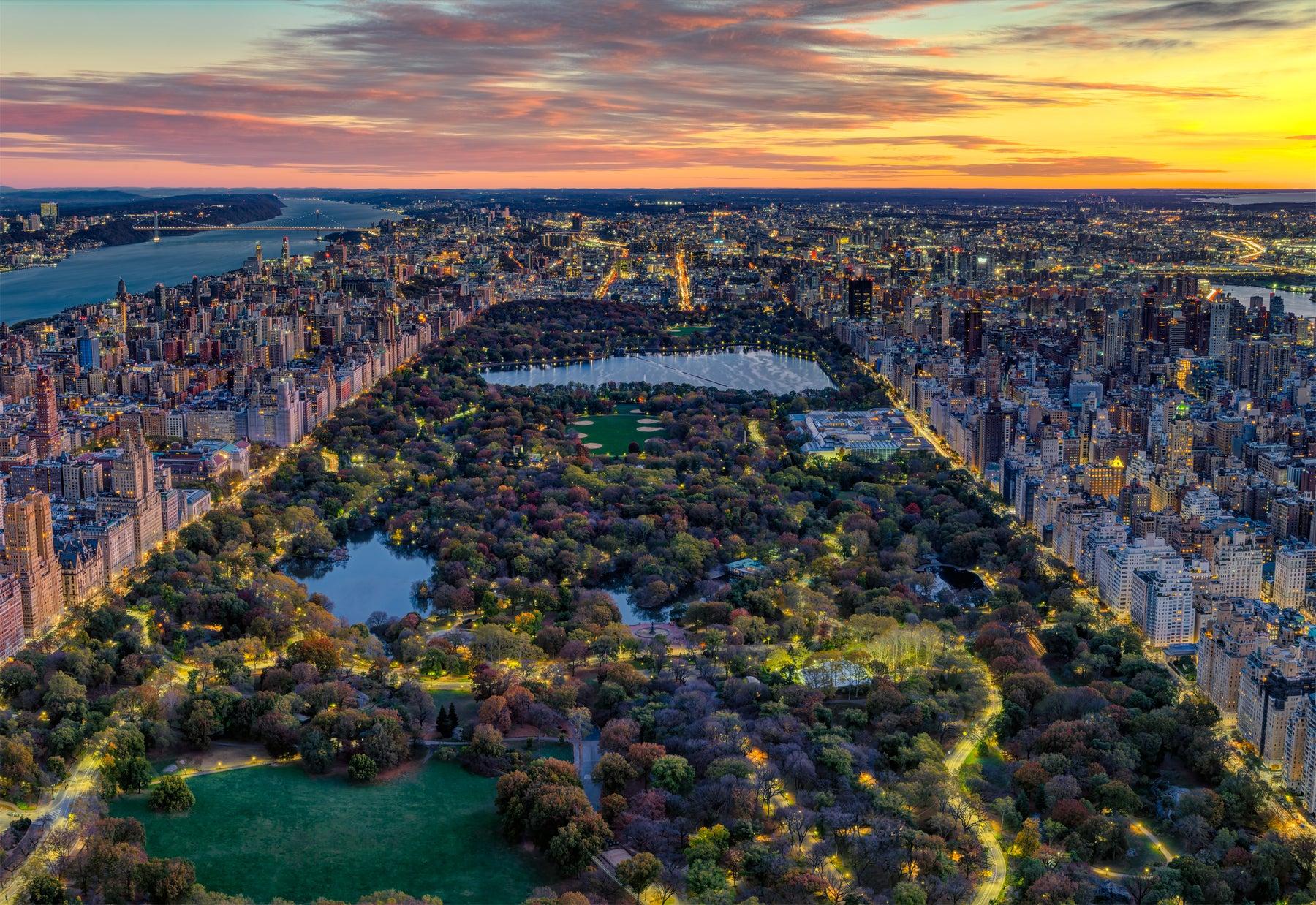 <h3>CENTRAL PARK</h3>Central Park, located in the heart of Manhattan, is a sprawling urban oasis that spans 843 acres and offers a serene retreat amidst the bustling cityscape of New York. Designed by Frederick Law Olmsted and Calvert Vaux and opened in 1858, the park features a diverse landscape of wooded areas, meadows, lakes, and recreational facilities. Visitors can stroll along picturesque paths, rent boats on the tranquil waters of the Central Park Lake, or relax in iconic spots like the Bethesda Terrace and Fountain or the Shakespeare Garden. Central Park is also home to numerous attractions, including the Central Park Zoo, the Conservatory Garden, and the famous Central Park Carousel. It serves as a recreational haven for New Yorkers and tourists alike, offering opportunities for outdoor activities, cultural events, and a peaceful escape from the hustle and bustle of city life.