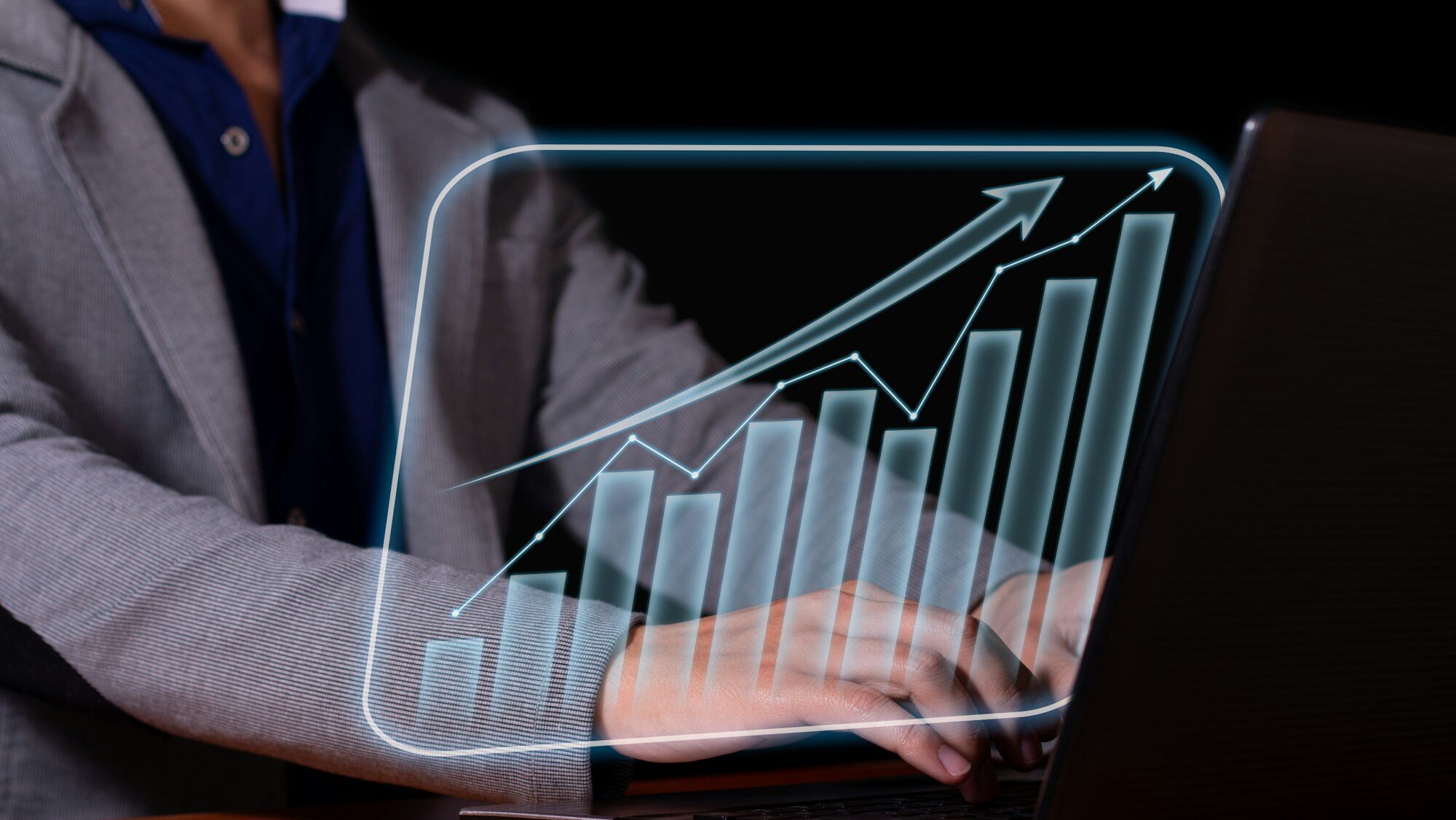 Entrepreneur analyzes economic and financial growth. Investment chart and economic trends.